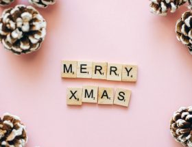 merry xmas text on wooden scrabble tiles