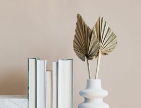 geometric marble shelf with books and decorative vase