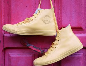 hanging yellow converse high top sneakers