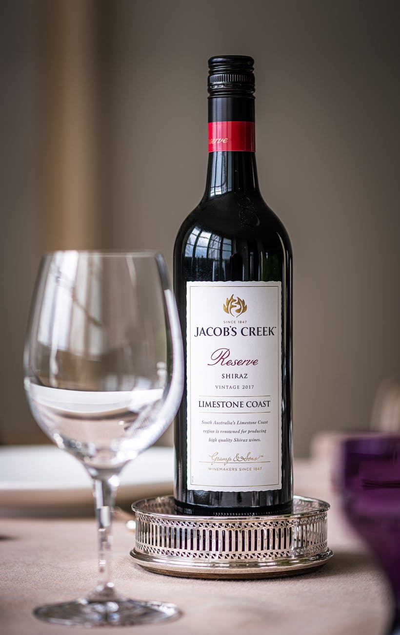 jacob s creek reserve bottle with wine glass