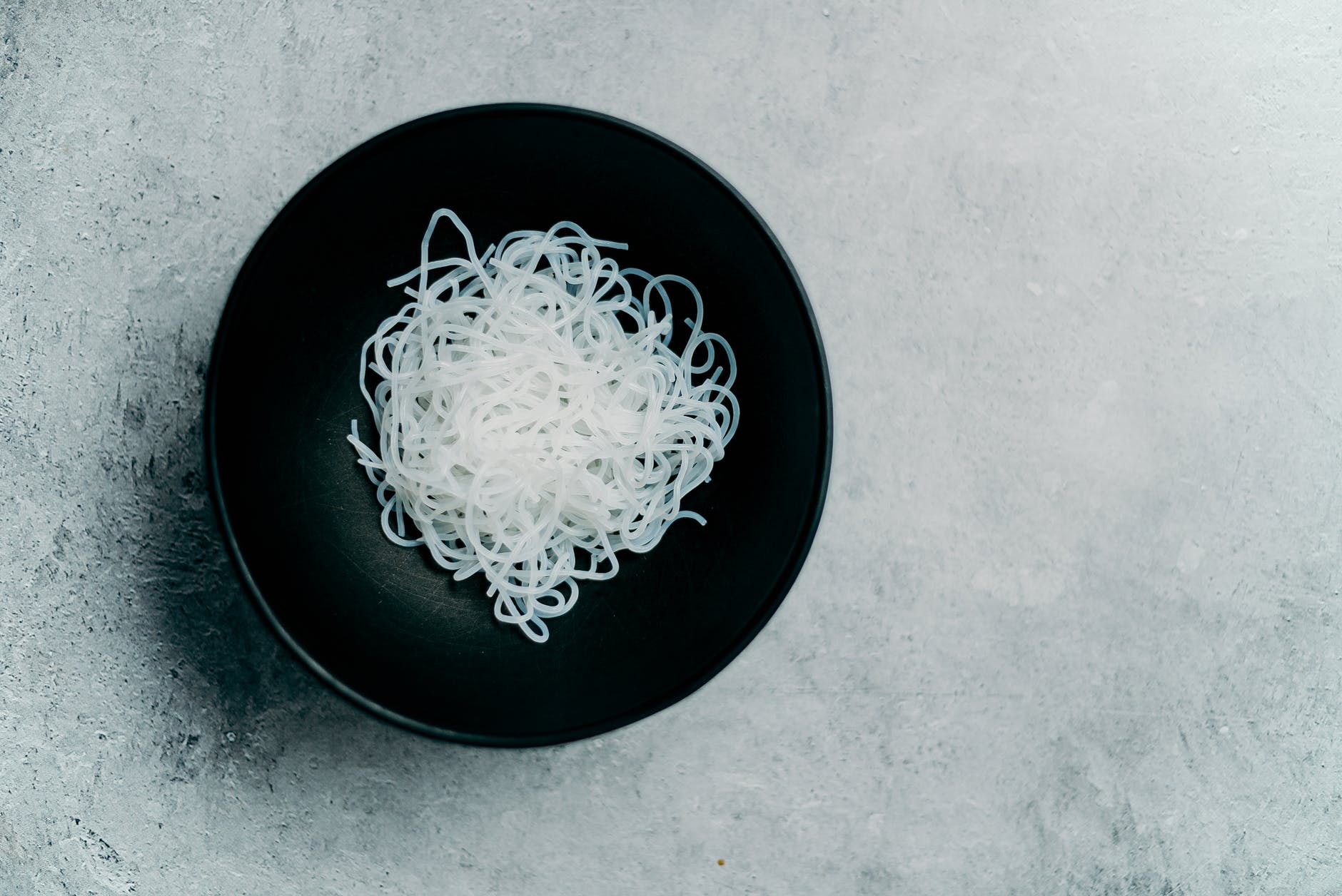 photo of noodles on bowl