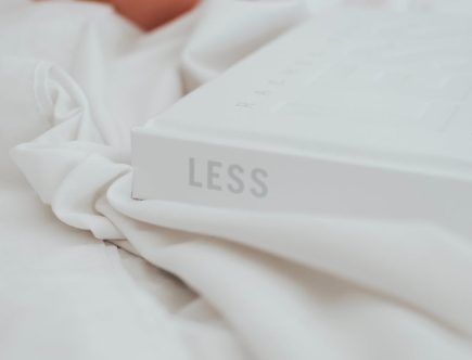 white book on white textile